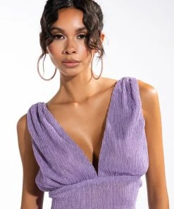 POISED SLEEVELESS V NECK PEPLUM BLOUSE