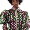 THAT GIRL IS POISON ORGANZA BUTTON DOWN BLOUSE